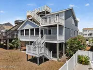 74 Private Drive, Ocean Isle Beach, NC 28469 — 4-bedroom home in Summer Place, Ocean Isle Beach, NC, photo 2 of 47: View from side