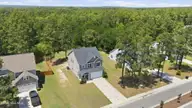 192 Sandy Springs Road, Aberdeen, NC 28315 — 4-bedroom home in Sandy Springs, Aberdeen, NC, photo 3 of 45: 7-web-or-mls-DJI_20260514140507_0305_D-e