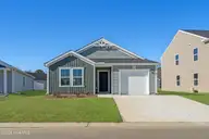 6998 Seaside Palms Place SW, Sunset Beach, NC 28468 — 3-bedroom home in Seaside Palms, Sunset Beach, NC, photo 2 of 34: Vantage_6998 Seaside Palms PL_Lot 62 - 0
