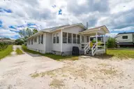 1096 Salter Path Road, Salter Path, NC 28512 — 4-bedroom waterfront home in Salter Path, Salter Path, NC, photo 4 of 30: 2-web-or-mls-1086-salter-path-rd-2