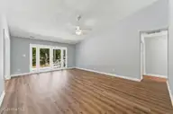 1122 Barkentine Drive, New Bern, NC 28560 — 3-bedroom waterfront home in Fairfield Harbour, New Bern, NC, photo 12 of 56: Vaulted ceiling - access to deck