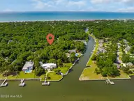117 White Ash Drive, Pine Knoll Shores, NC 28512 — waterfront lot in Pine Knoll Association, Pine Knoll Shores, NC, photo 14 of 40: Build your dream home on White Ash Dr