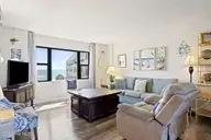 1505 Salter Path Road 412, Indian Beach, NC 28512 — 3-bedroom waterfront condo in Summer Winds Condominiums, Indian Beach, NC, photo 4 of 54: Living Room