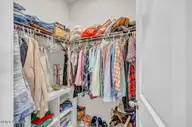 2052 Willowleaf Drive, Leland, NC 28451 — 4-bedroom home in Grayson Park, Leland, NC, photo 18 of 50: Primary Closet