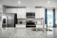 115 Sweet Clover Way, Greenville, NC 27834 — 2-bedroom home in Carolina Crofts, Greenville, NC, photo 4 of 15: 05 kitchen(2)