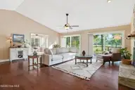 25 Turtle Point Road 1, Pinehurst, NC 28374 — 3-bedroom home in Unit 1, Pinehurst, NC, photo 10 of 63: Living Room to Sunroom