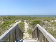 323 Caswell Beach Road, Oak Island, NC 28465 — 5-bedroom waterfront home in Caswell Beach, Oak Island, NC, photo 22 of 54: 323 Caswell Beach