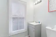 909 1st Street, Elizabeth City, NC 27909 — 3-bedroom home in Improvment Co of E.C., Elizabeth City, NC, photo 21 of 26: Hall Bathroom