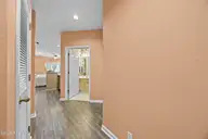 213 Kings Trail # 1004, Sunset Beach, NC 28468 — 2-bedroom condo in Sea Trail Plantation, Sunset Beach, NC, photo 20 of 52: 4_hallway