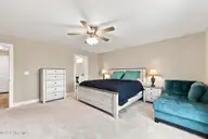 1504 Mainsail Road, Morehead City, NC 28557 — 4-bedroom waterfront home in Mariners Point, Morehead City, NC, photo 24 of 68: Primary Bedroom