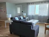 1103 Ocean Drive E & W, Emerald Isle, NC 28594 — 6-bedroom waterfront home, Emerald Isle, NC, photo 12 of 65: living room & entry