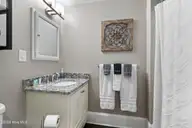 21 N Front Street Unit 3d1, Wilmington, NC 28401 — 1-bedroom condo in Downtown, Wilmington, NC, photo 15 of 41: Downstairs Bathroom (2)