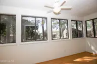 250 Sugar Gum Lane 124, Pinehurst, NC 28374 — 3-bedroom condo in Lakeview Condos, Pinehurst, NC, photo 11 of 55: Sunroom
