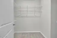 6787 Fellowship Drive, Leland, NC 28451 — 4-bedroom townhome in Grand Park, Leland, NC, photo 16 of 46: Primary closet