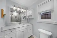 1304 Two Mile Circle E, Wilmington, NC 28405 — 3-bedroom home in Eastwood Village, Wilmington, NC, photo 11 of 43: 1304 vanity