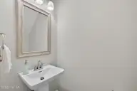 9575 Lily Pond Court NE, Leland, NC 28451 — 4-bedroom home in Lily Pond, Leland, NC, photo 19 of 37: downstairs powder room