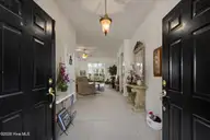 7429 Prestwick Court SW, Sunset Beach, NC 28468 — 3-bedroom home in Sandpiper Bay, Sunset Beach, NC, photo 3 of 41: Entrance
