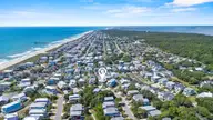 185 Seawatch Way, Kure Beach, NC 28449 — 5-bedroom waterfront home in Seawatch, Kure Beach, NC, photo 3 of 72: 76_drone