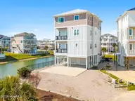 13 Via Dolorosa Drive, Ocean Isle Beach, NC 28469 — 6-bedroom waterfront home in Islander Resort, Ocean Isle Beach, NC, photo 5 of 74: 3-web-or-mls-CAMMediaLLC.com-106