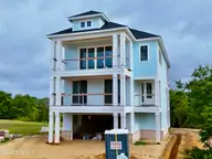 102 Marshland Circle, Newport, NC 28570 — 4-bedroom waterfront home in Cannonsgate, Newport, NC, photo 1 of 19: Front Elevation