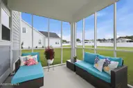 237 Coastline Circle, Cedar Point, NC 28584 — 4-bedroom home in Bridge View, Cedar Point, NC, photo 15 of 19: Screened Porch