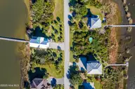 19 Osprey Drive, North Topsail Beach, NC 28460 — 4-bedroom waterfront home in Crystal Shores, North Topsail Beach, NC, photo 10 of 59: DJI_0200p