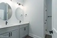 143 Laura Drive, New Bern, NC 28562 — 3-bedroom home in Forest Run, New Bern, NC, photo 17 of 27: Primary Bathroom