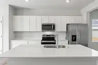 612 S Squires Run Lane, Richlands, NC 28574 — 4-bedroom home in Squires Run Village, Richlands, NC, photo 16 of 56: Kitchen
