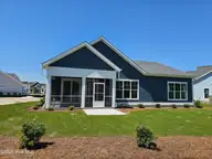 371 Longhill Drive, Wilmington, NC 28412 — 3-bedroom home in Riverlights, Wilmington, NC, photo 15 of 16: Rear of Home
