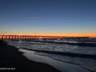 305 N Topsail Drive 5, Surf City, NC 28445 — 2-bedroom condo in Sea Coast, Surf City, NC, photo 22 of 28: Pier in the morning at sunrise right sid