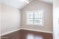 117 W Chelsea Court, Southern Pines, NC 28387 — 3-bedroom condo in Mid South Club, Southern Pines, NC, photo 23 of 43: Main Floor Guest Room