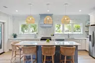 1748 Oakbrook Drive SW, Ocean Isle Beach, NC 28469 — 4-bedroom home in Brick Landing, Ocean Isle Beach, NC, photo 14 of 77: Eat-In Island
