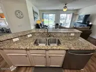 330 S Middleton Drive NW Unit 505, Calabash, NC 28467 — 2-bedroom waterfront condo in Brunswick Plantation, Calabash, NC, photo 14 of 72: 505 kitchen island