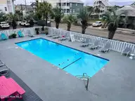 918 Carolina Beach Avenue N 2b, Carolina Beach, NC 28428 — 2-bedroom waterfront condo in A Place At The Beach, Carolina Beach, NC, photo 20 of 28: 918 CB Ave N 2B pool2