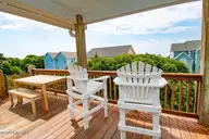 101 Shipwreck Lane E, Emerald Isle, NC 28594 — 3-bedroom waterfront townhome in Spinnakers Reach, Emerald Isle, NC, photo 16 of 38: Deck on Level 3
