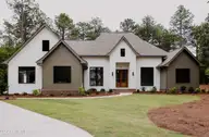 12 Eastman Place, Pinehurst, NC 28374 — 5-bedroom home in Forest Creek, Pinehurst, NC, photo 1 of 32: Front
