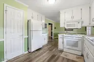 101 Shilou Drive, Pikeville, NC 27863 — 3-bedroom home in Sparrow Point, Pikeville, NC, photo 15 of 34: 101 Shilou Dr-Kitchen 5