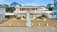 166 Ocean Boulevard W, Holden Beach, NC 28462 — 4-bedroom waterfront home in Holden S E, Holden Beach, NC, photo 1 of 46