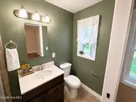 34 Holland Drive, Castle Hayne, NC 28429 — 3-bedroom home in Wrightsboro Acres, Castle Hayne, NC, photo 10 of 22: Bathroom 2