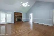 106 Duchess Drive, Winterville, NC 28590 — 3-bedroom home in Windsor, Winterville, NC, photo 15 of 46: spacious living room with fire place