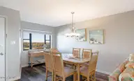 1505 Salter Path Road 325, Indian Beach, NC 28512 — 4-bedroom waterfront condo in Summer Winds Condominiums, Indian Beach, NC, photo 9 of 46: Dining Area