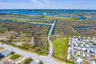 23 23 Hunter Heath Drive, North Topsail Beach, NC 28460 — waterfront lot in Ashe Island Farm, North Topsail Beach, NC, photo 5 of 20: 23HH showing the front