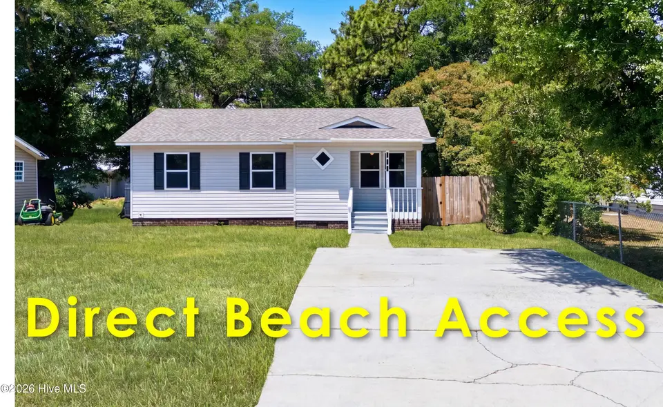 111 NE 20th Street, Oak Island, NC 28465 — 3-bedroom home in Tranquil Harbour Island, Oak Island, NC, photo 1 of 47
