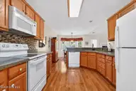 108 Quarter Horse Run, Havelock, NC 28532 — 3-bedroom home in Cherry Branch, Havelock, NC, photo 7 of 31: Kitchen from Dining Room