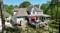 114 Killdeer Drive, Hampstead, NC 28443 — 4-bedroom waterfront home in Pelican Reef, Hampstead, NC, photo 9 of 57: dji_fly_20260417_114326_71_1776471524093