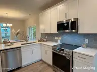 100 S Bandwheel Way, Hampstead, NC 28443 — 3-bedroom home in Sawyers Run, Hampstead, NC, photo 7 of 20: kitchen 100S Bandwheel