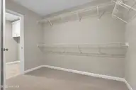 6830 Fellowship Drive, Leland, NC 28451 — 5-bedroom home in Grand Park, Leland, NC, photo 20 of 49: Primary Closet