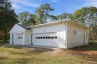 2001 Watson Avenue, Newport, NC 28570 — 3-bedroom home, Newport, NC, photo 5 of 52: Side Elevation - Garage