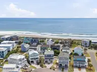 110 Seaward Court, Kure Beach, NC 28449 — 5-bedroom waterfront home in Kure by the Sea, Kure Beach, NC, photo 2 of 60: 055_110_seaward_court-55_340