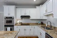 205 E Loon Court, Hampstead, NC 28443 — 3-bedroom home in Pelican Reef, Hampstead, NC, photo 13 of 68: kitchen-01d